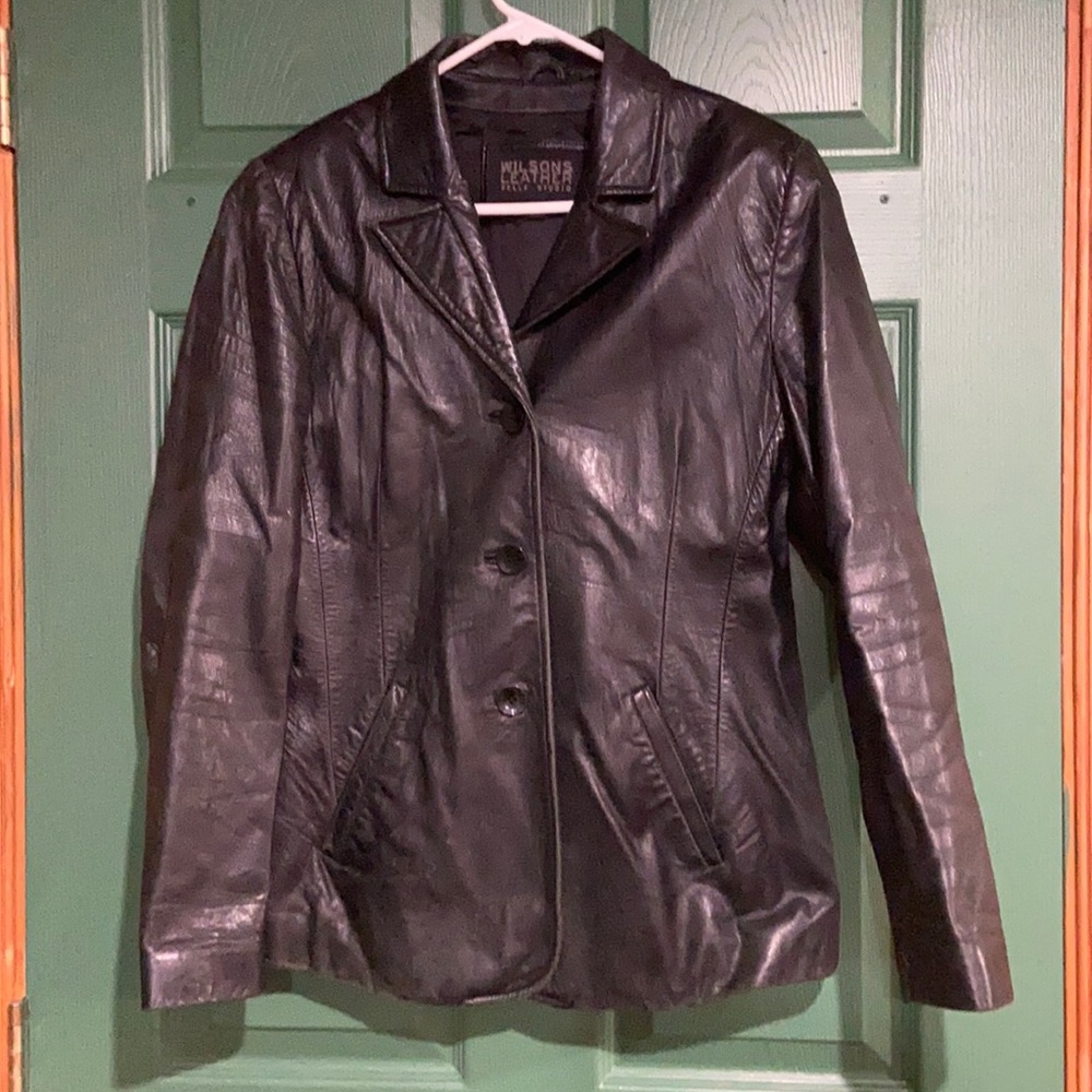 Woman’s black leather jacket with liner